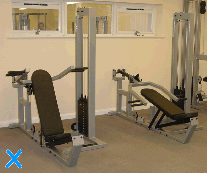 Versatile Multi-press machines (2 shown with silver frame and black upholstery).